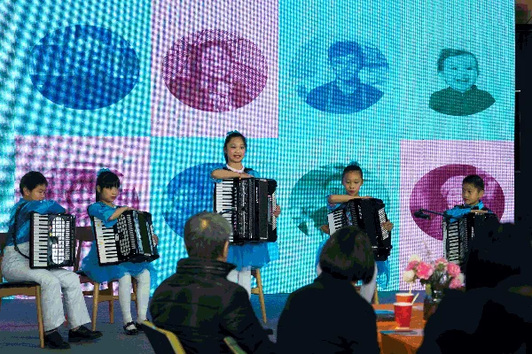Children performing with accordions at the Siping Open Street Festival